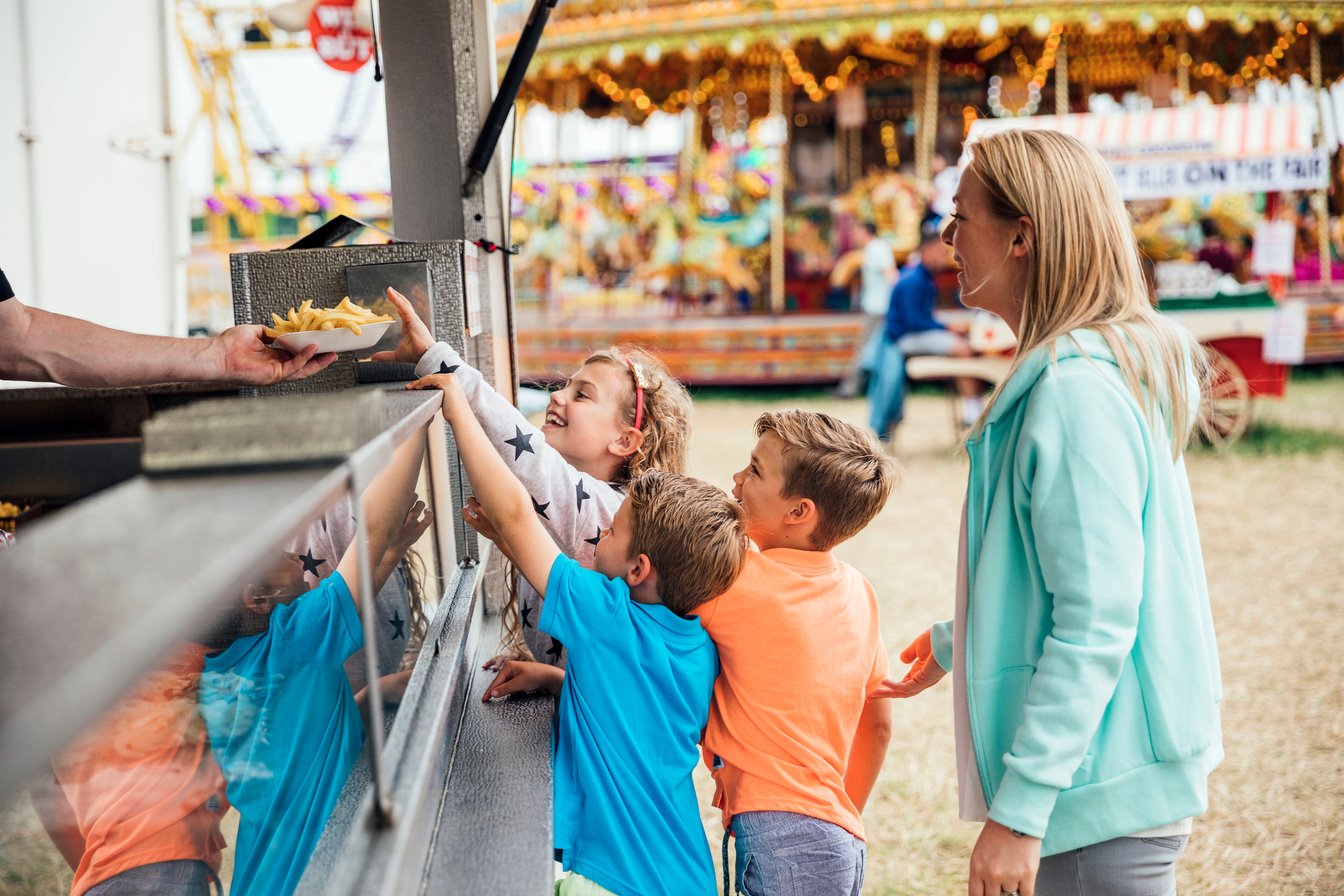 Family getting Food at the Fairground